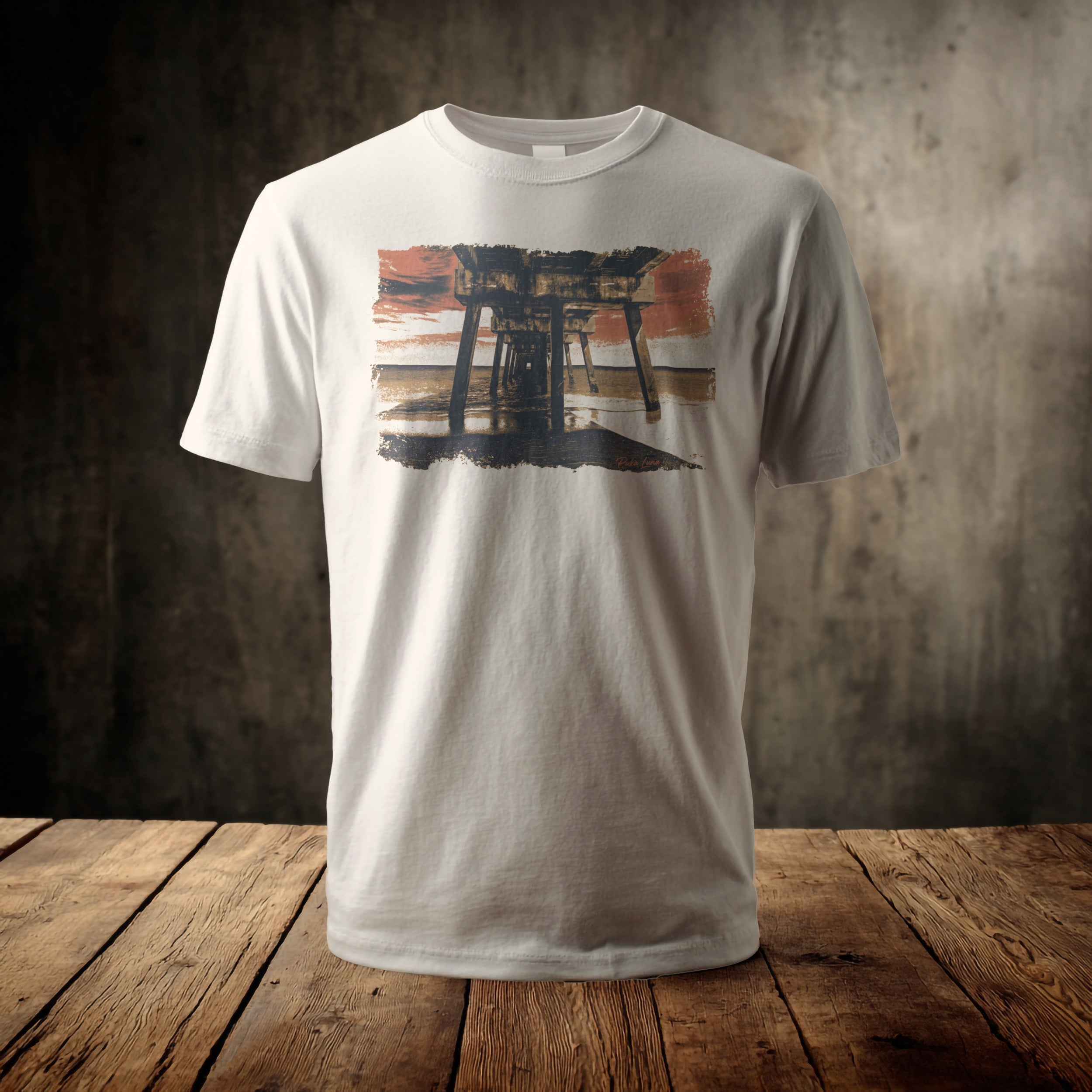 White t-shirt with a rustic pier at sunset graphic.