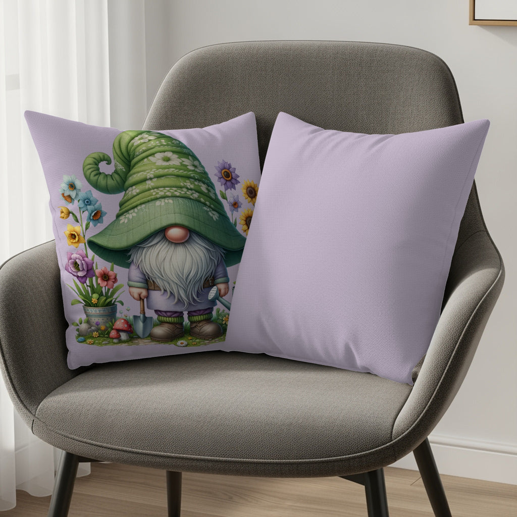 Gnome with watering can and flowers on pillow, next to plain purple pillow on chair.