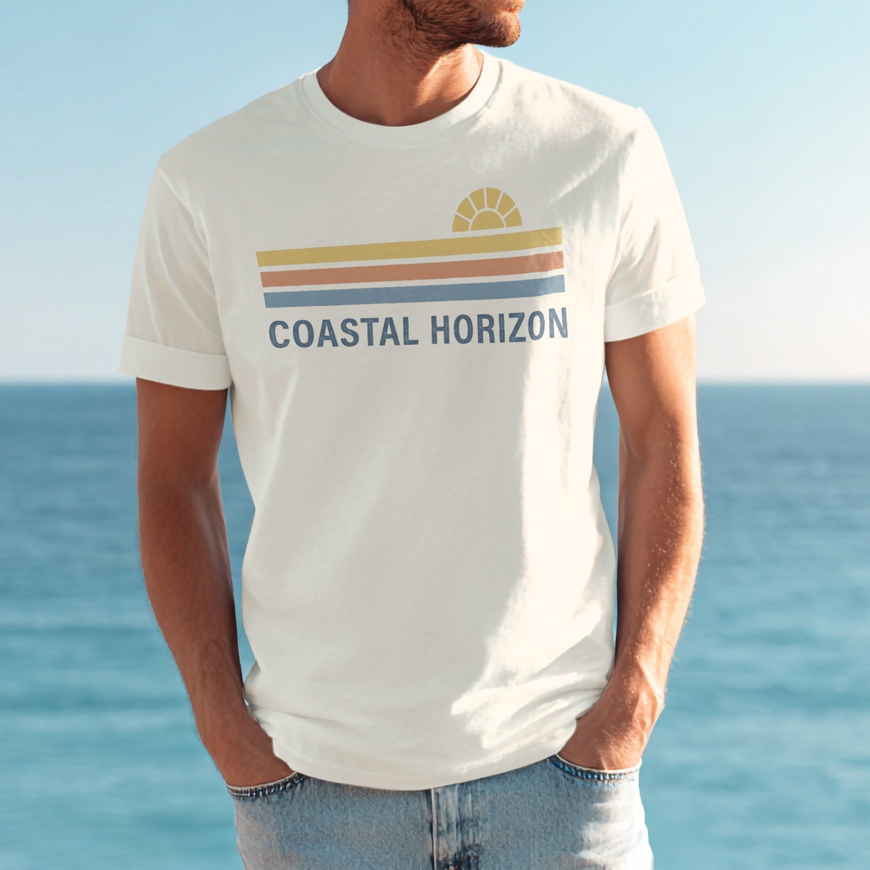 White t-shirt with "COASTAL HORIZON" and striped sun graphic.