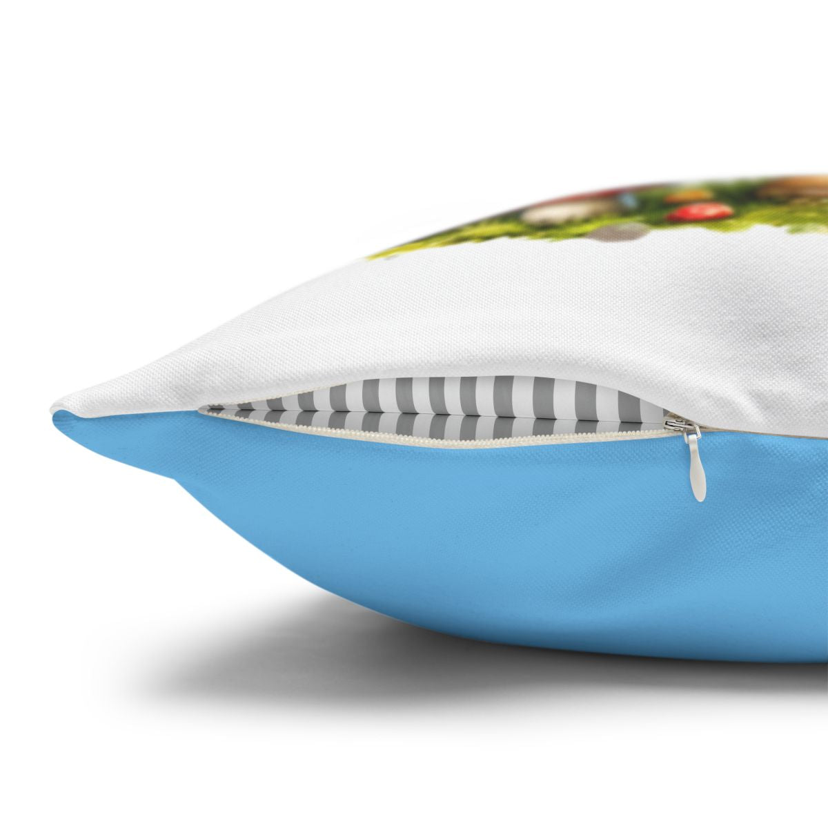 Blue throw pillow with zipper closure and striped interior detail.