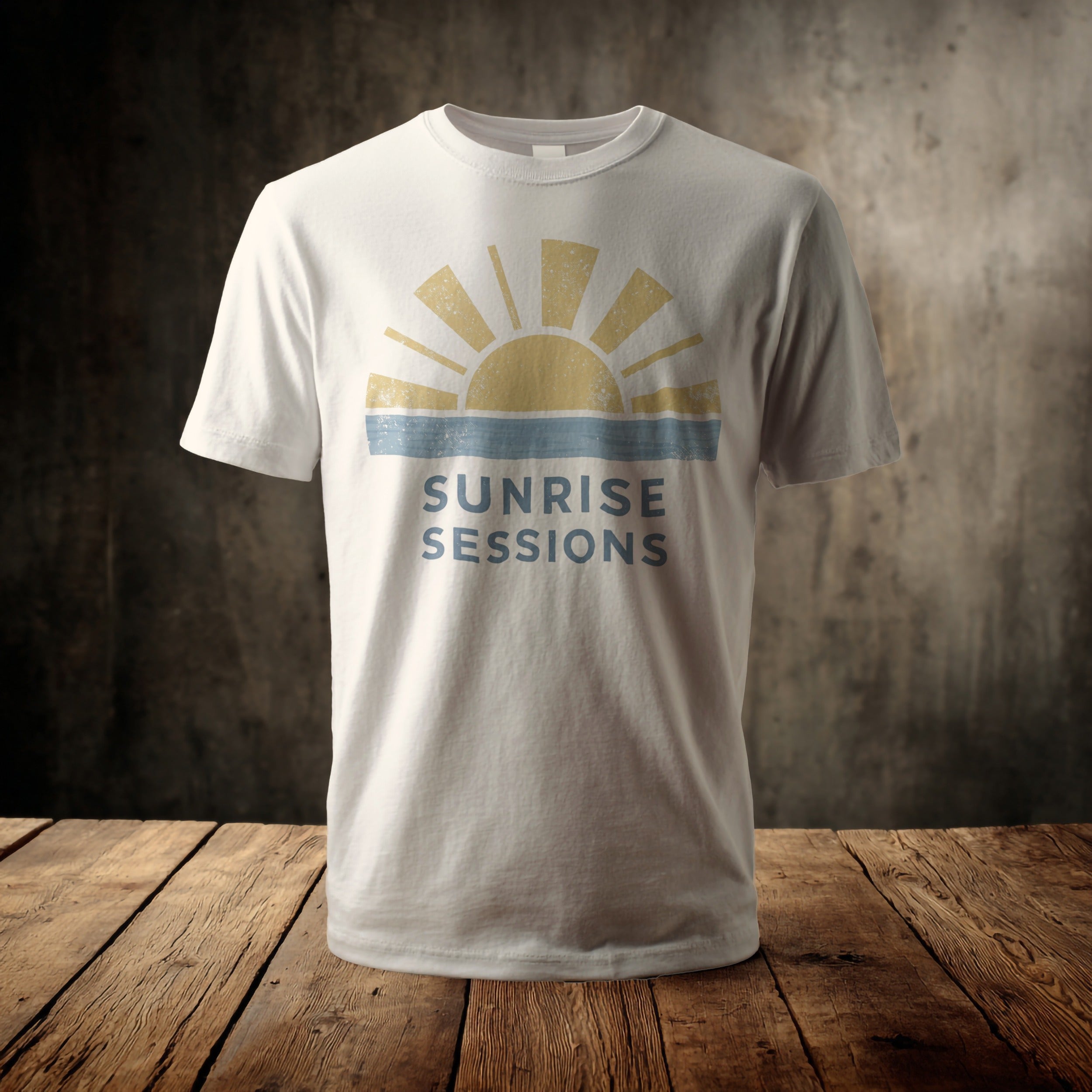 White t-shirt with yellow sunburst and "Sunrise Sessions" text.