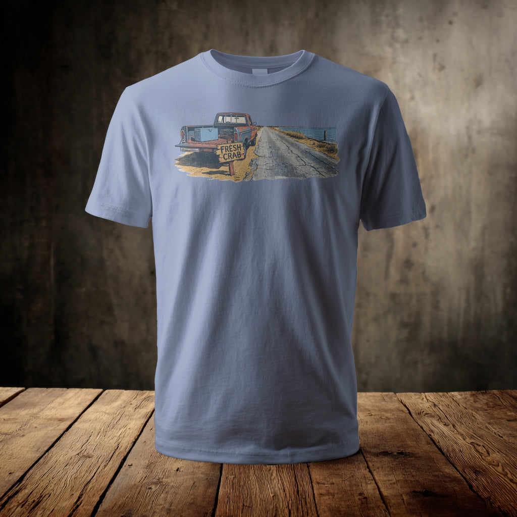 Light blue t-shirt with a graphic of a vintage truck and "FRESH CRAB" sign.