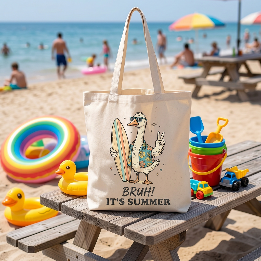 Tote bag with a cartoon duck on a surfboard and "Bruh! It's Summer" text.