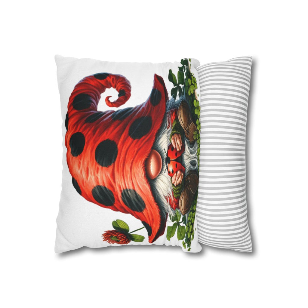 Pillow with ladybug-themed gnome face and striped back.