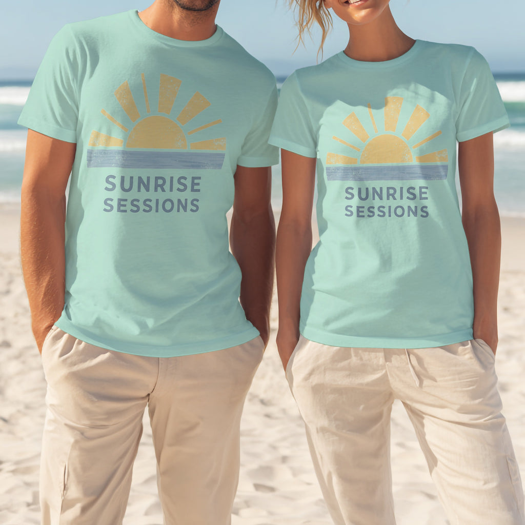 Two people wearing matching aqua t-shirts with "SUNRISE SESSIONS" text and a sun graphic.