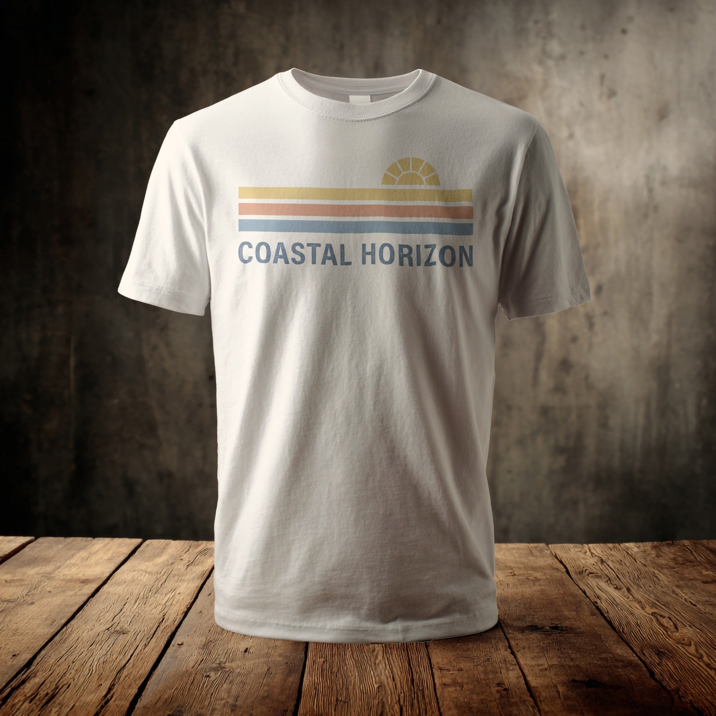 White t-shirt with "Coastal Horizon" text and a striped sun graphic.