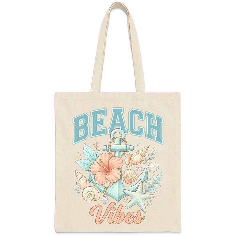 Tote bag with anchor, hibiscus, seashells, and "Beach Vibes" text.