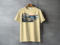 T-shirt with graphic of truck bed with cooler, chairs, and fishing rods.