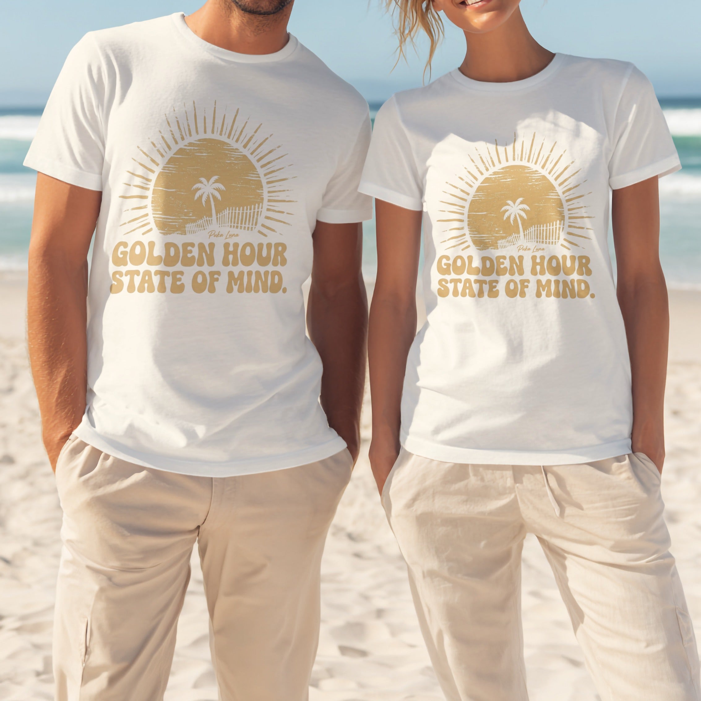 White t-shirts with "Puka Luna Golden Hour State of Mind" text and sun graphic.