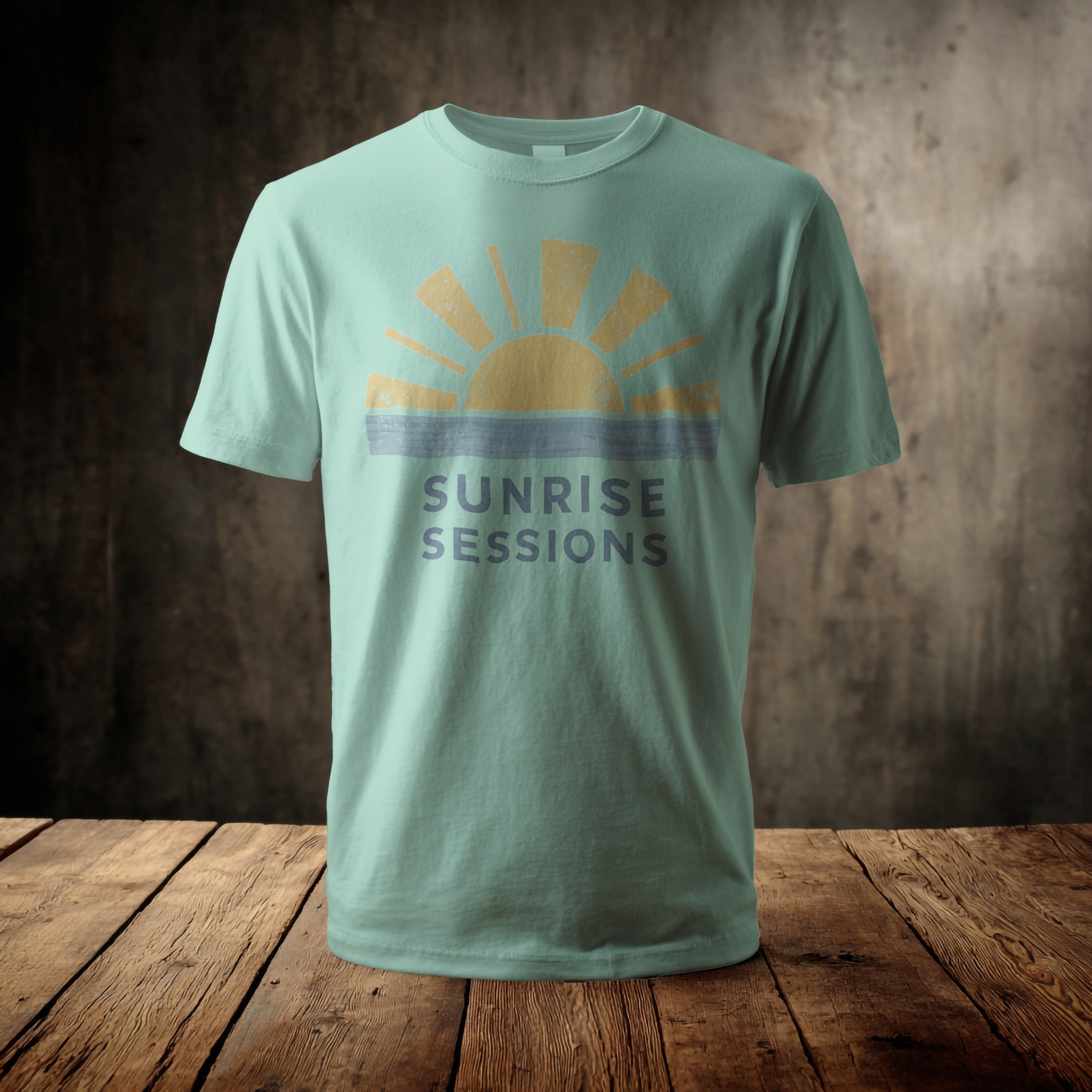 Light blue t-shirt with "SUNRISE SESSIONS" text and a sunburst graphic.