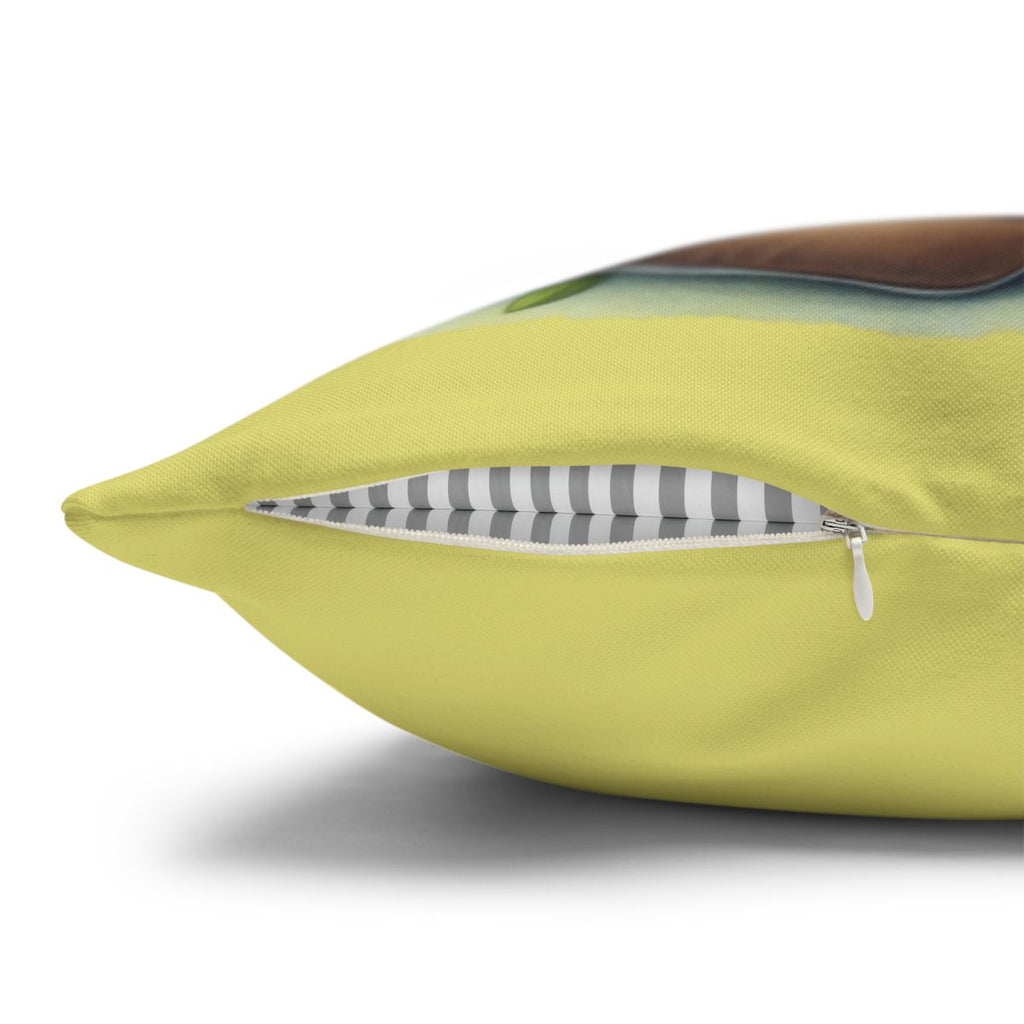 Yellow throw pillow with a visible zipper and gray striped lining.