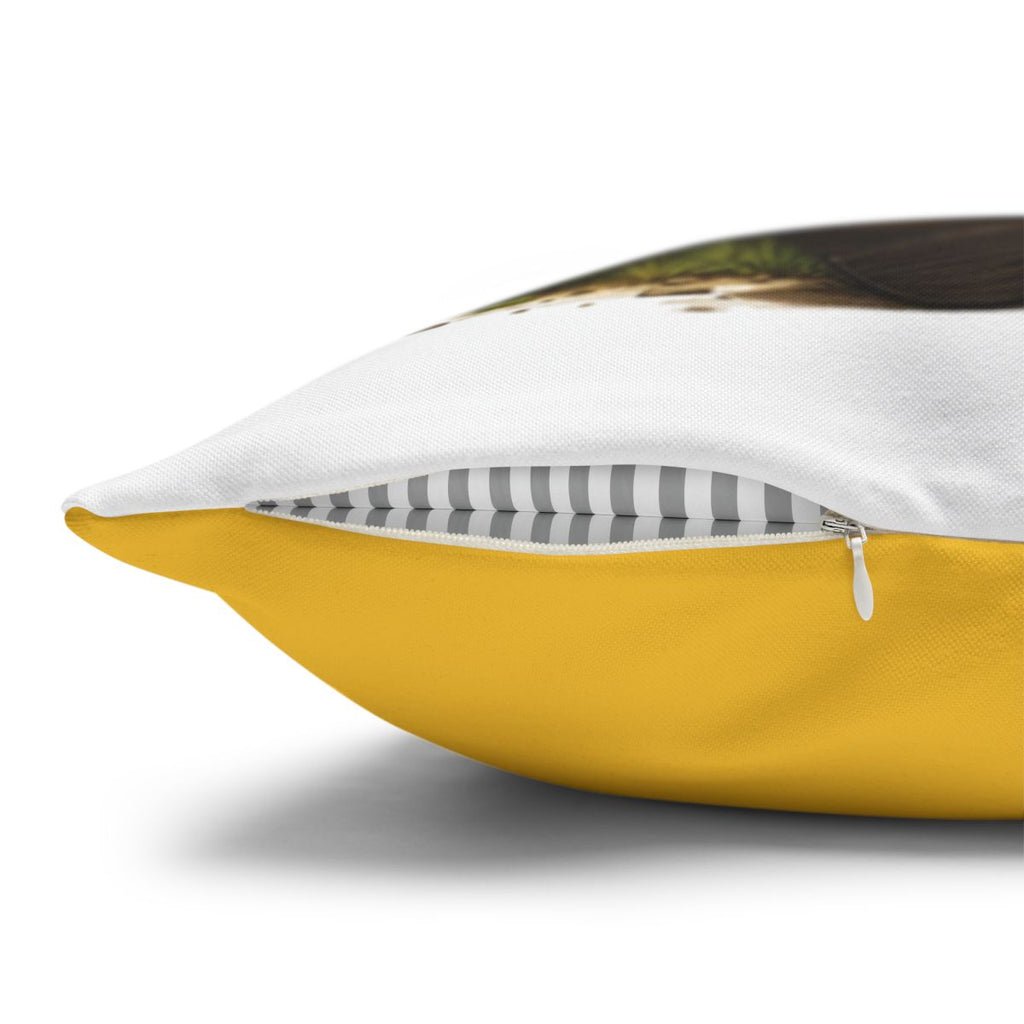 Yellow pillow with gray and white striped insert peeking out of a zipper.