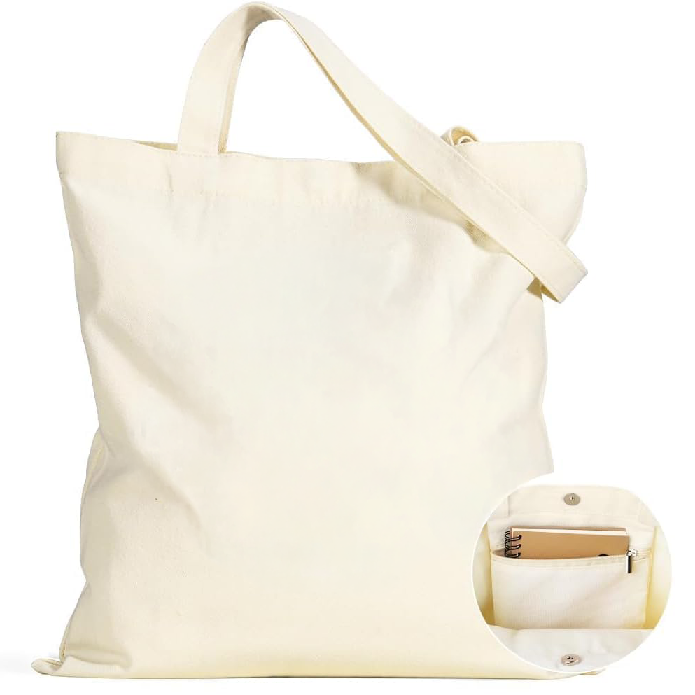 Natural canvas tote bag with exterior zippered pocket and interior pocket.