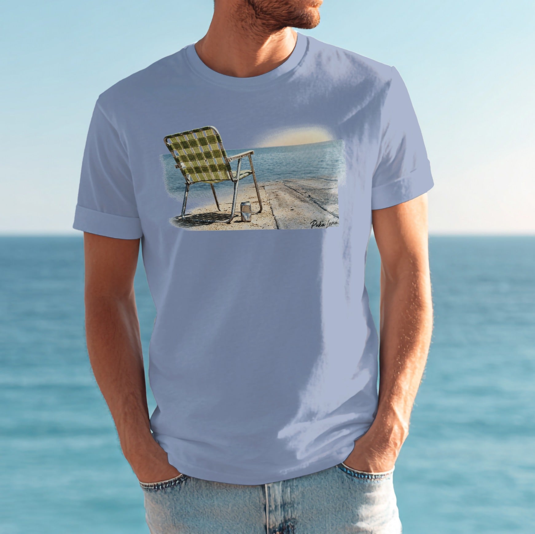 Light blue t-shirt with a checkered beach chair on a pier.