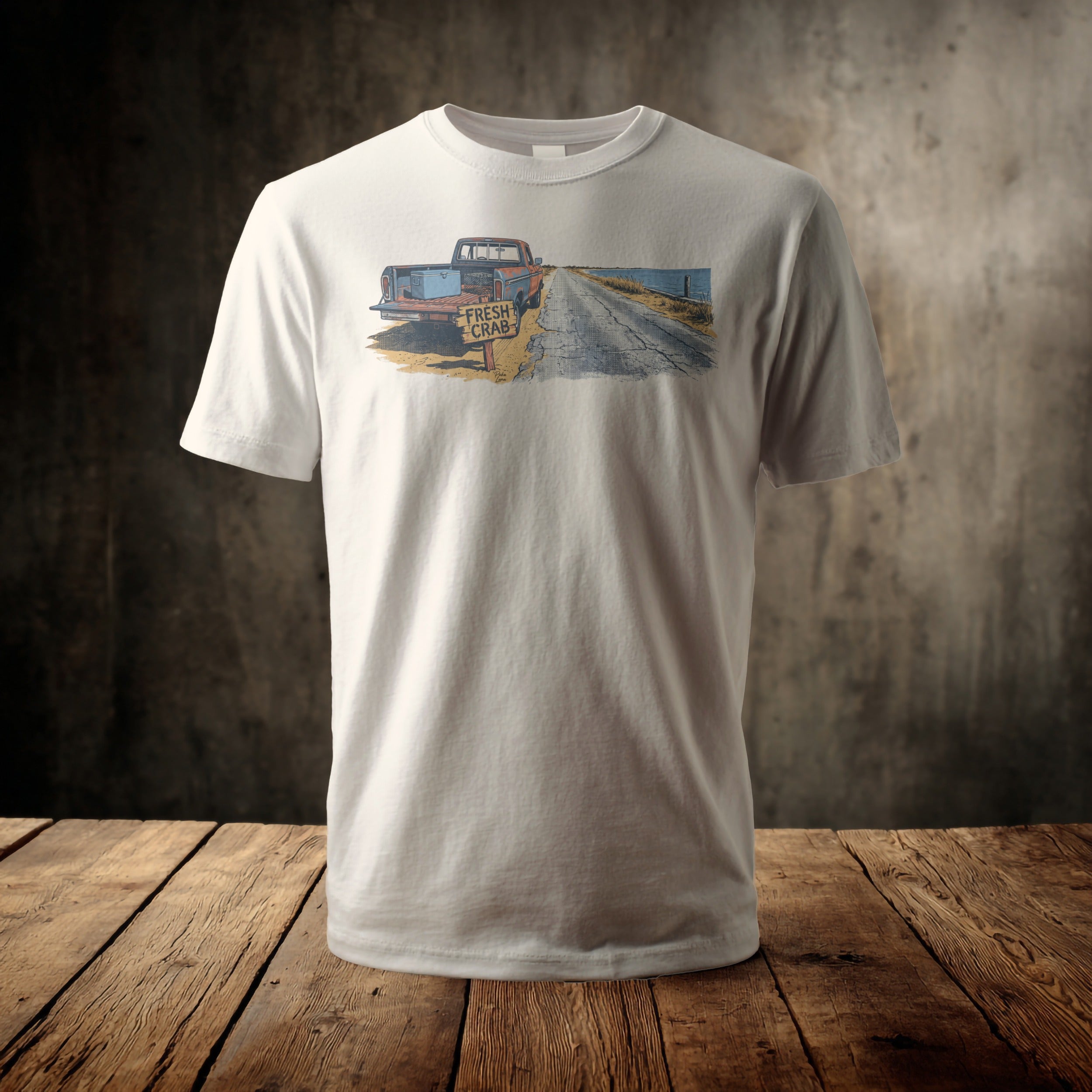 White t-shirt with a graphic of a truck and a "FRESH CRAB" sign.