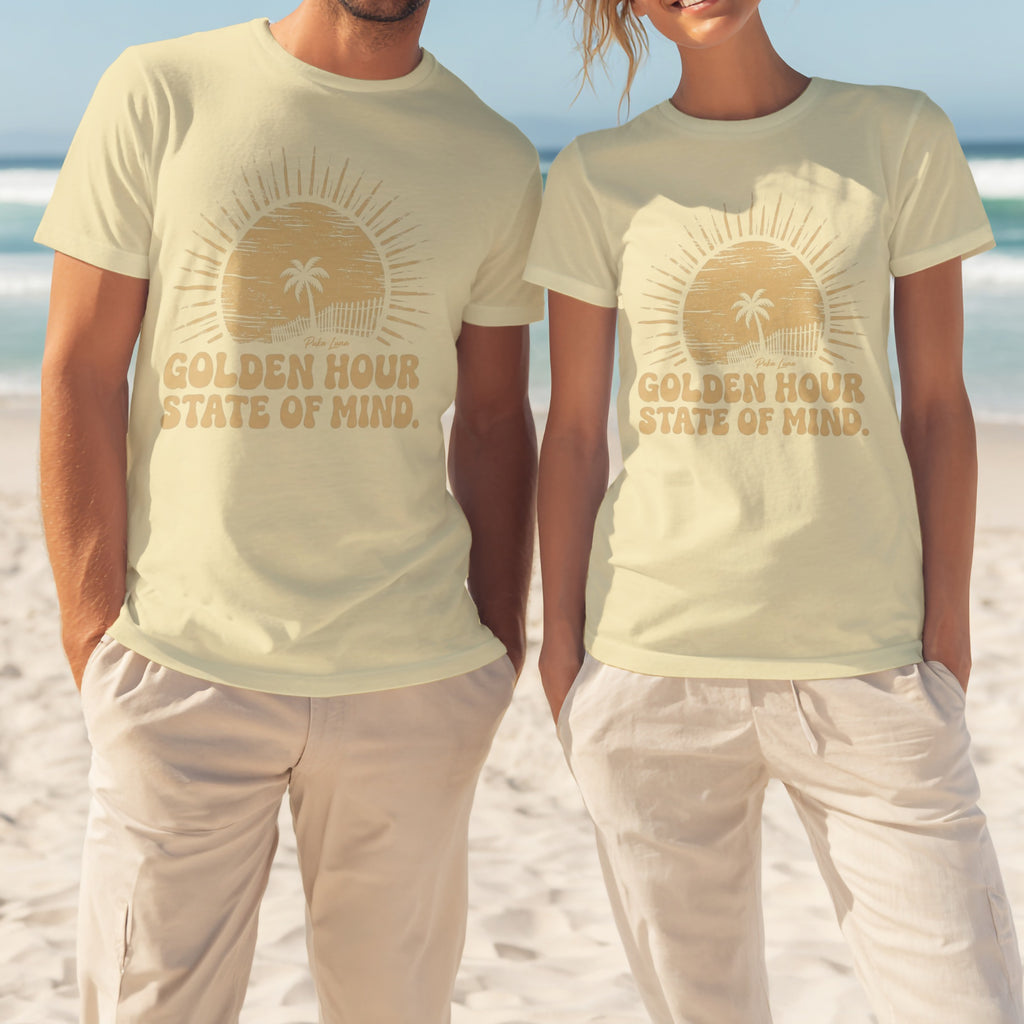 T-shirts with "Puka Luna GOLDEN HOUR STATE OF MIND" text and a sunset graphic.