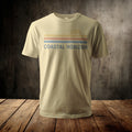 Light tan t-shirt with "Coastal Horizon" text and a sun graphic.