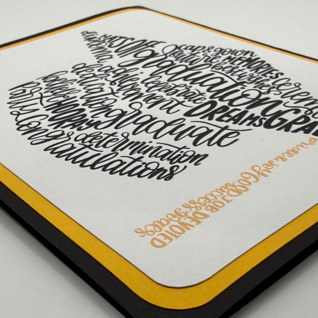 Graduation Card – Mortarboard Word Art in Black & Gold