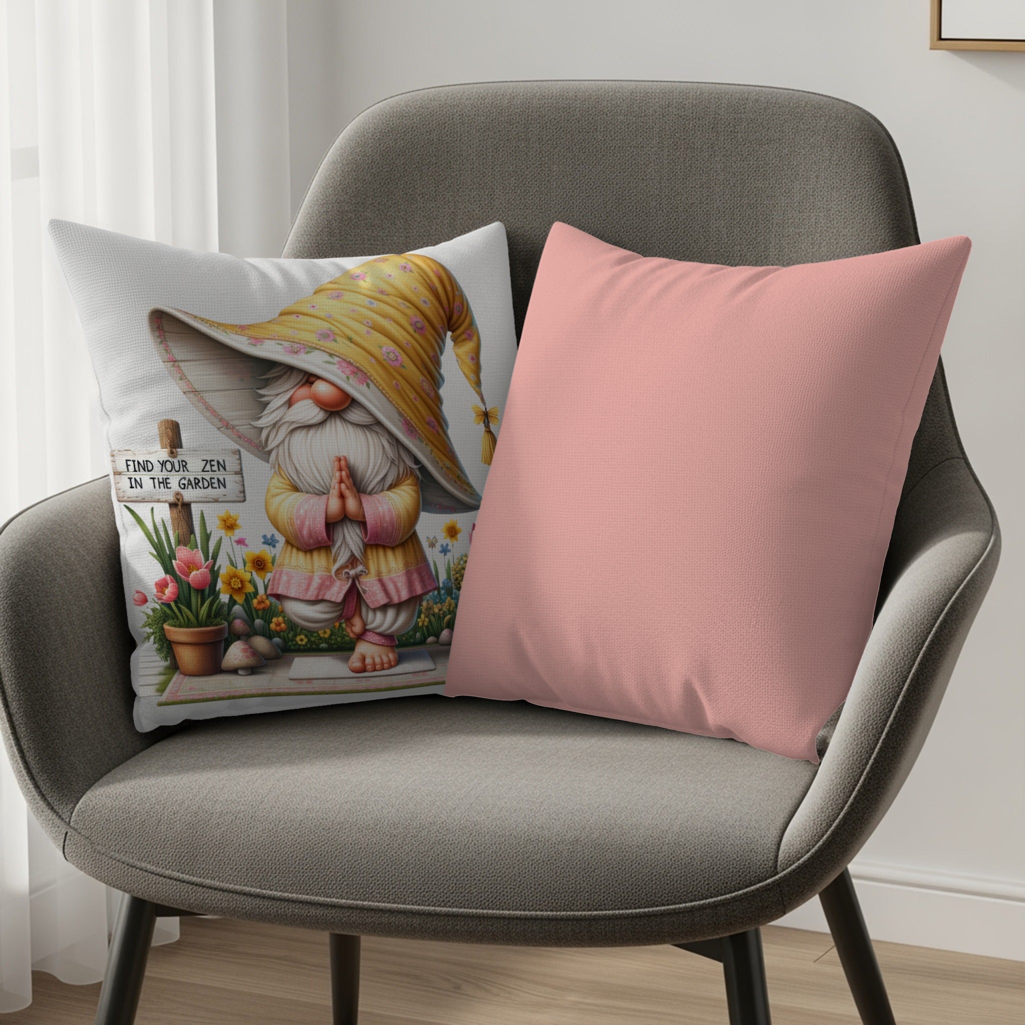 Gnome with yellow hat and pink flowers on cushion, next to solid pink cushion.